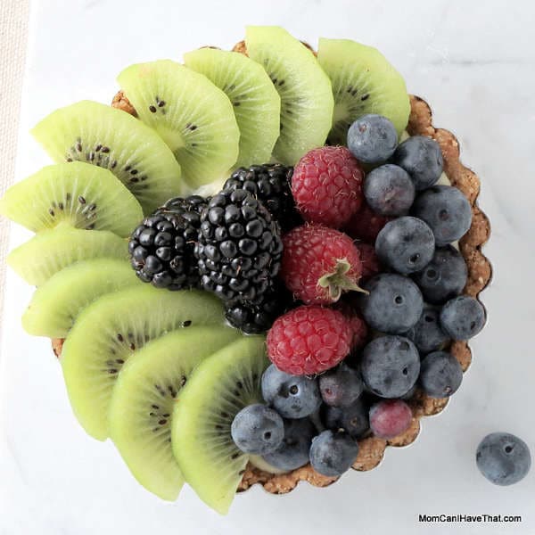 These Fresh Fruit Tarts are filled with coconut milk pastry cream and have a coconut-almond crust | Low carb, Gluten-free & Casein-free | lowcarbmaven.com