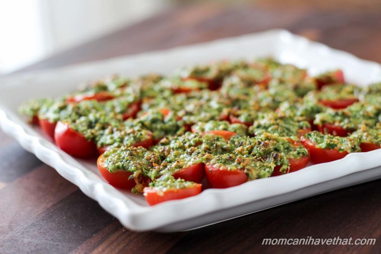 Baked parmesan tomatoes on a plate.