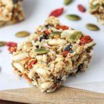 Gluten-free oats, nuts, & seeds make the base for these lightly - sweetened Kitchen Sink Snack Bars healthy - currents, puffed rice & gogi berries make them fun.| gluten-free, dairy-free | MomCanIHaveThat.com