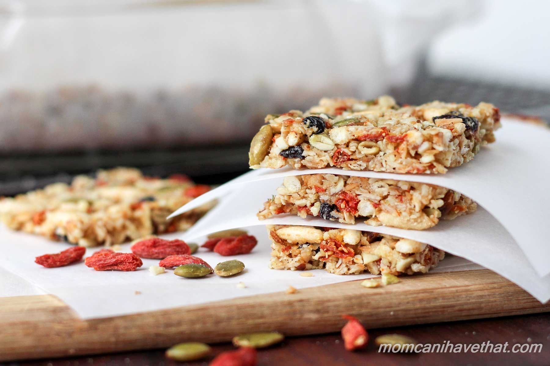 Gluten-free oats, nuts, & seeds make the base for these lightly - sweetened Kitchen Sink Bars healthy - currents, puffed rice & gogi berries make them fun.| gluten-free, dairy-free | MomCanIHaveThat.com