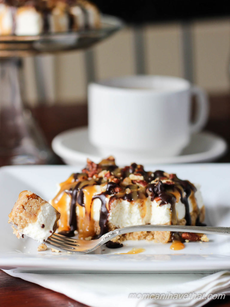 Pecan Turtle Cheesecake Bars have a brown sugar pecan crust & light-textured vanilla cheesecake topped with toasted pecans, chocolate fudge, & caramel. No-bake, low carb & sugar free | lowcarbmaven.com