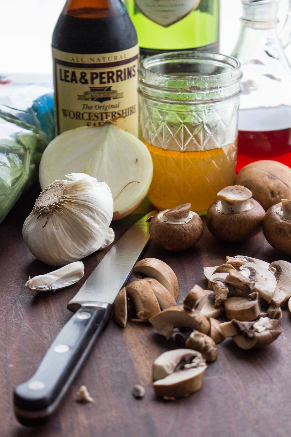 Ingredients for chicken Florentine crepes - mushrooms, onions, garlic, spinach, chicken broth, red wine vinegar, sherry.