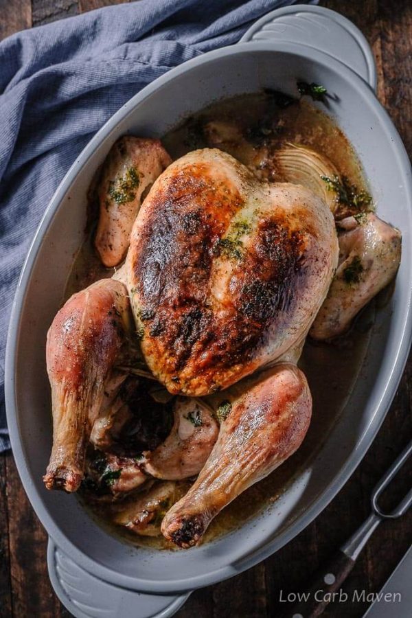 Simple oven roasted chicken with herbed butter and crispy skin is perfect for Sunday supper or meal prep for low carb and keto diets.