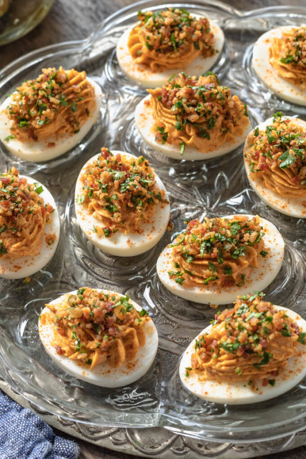 Spicy deviled eggs with bacon and cilantro